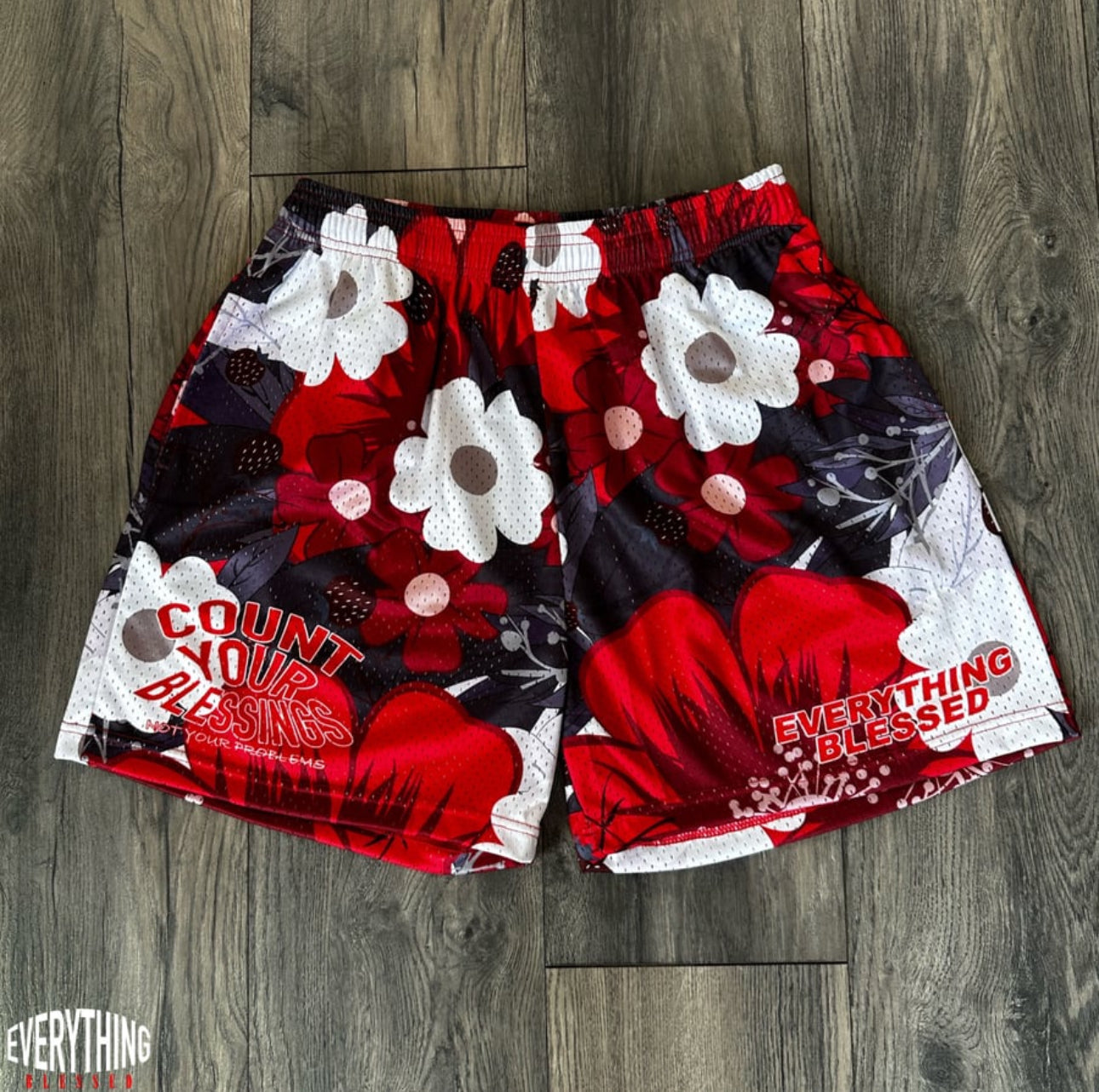 RED FLORAL “C.Y.B.N.Y.P” MESH SHORTS