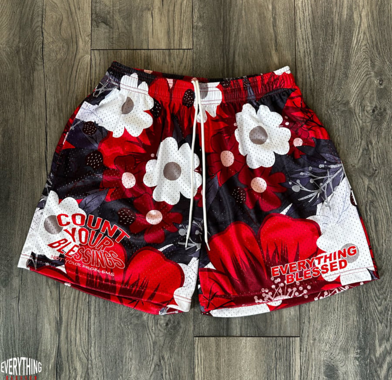 RED FLORAL “C.Y.B.N.Y.P” MESH SHORTS