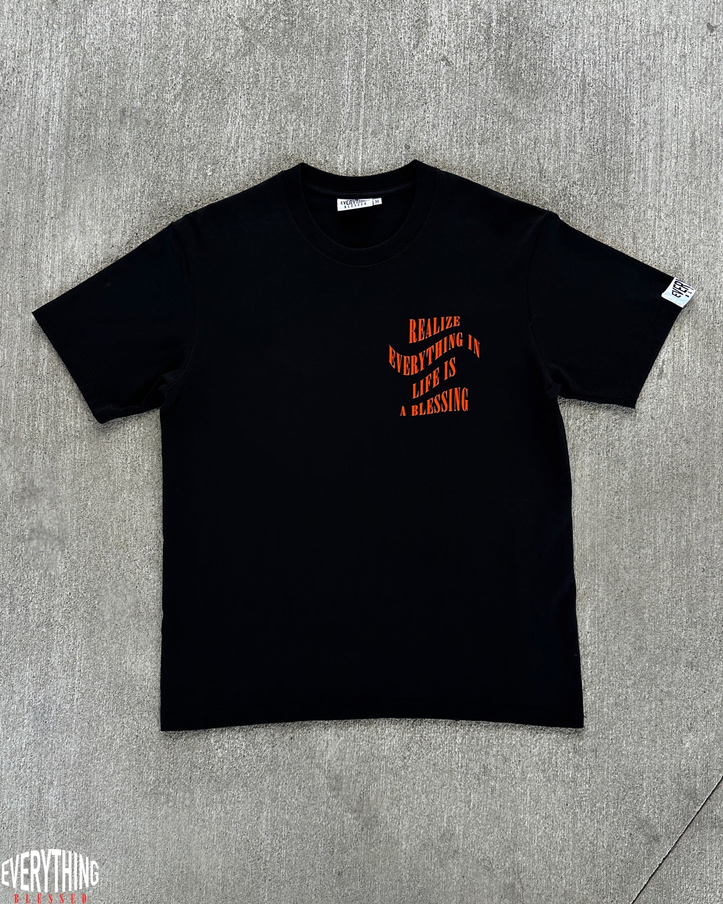 BLACK/ORANGE SLOGAN T-SHIRT